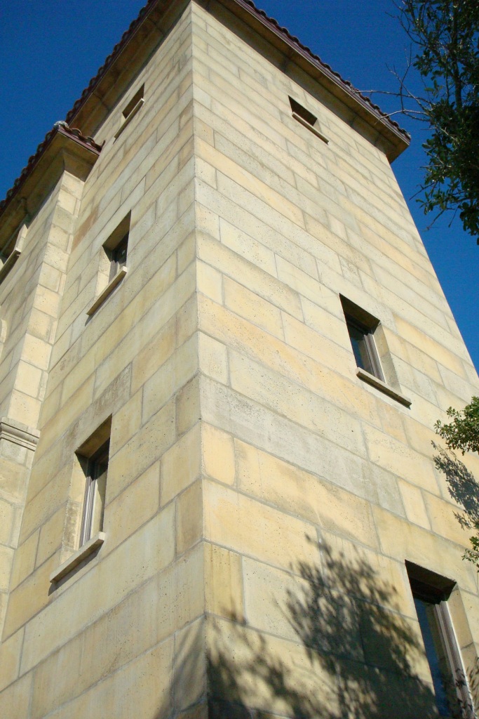 stone tower of DAC-ART coastal stone home in Gulf Shores